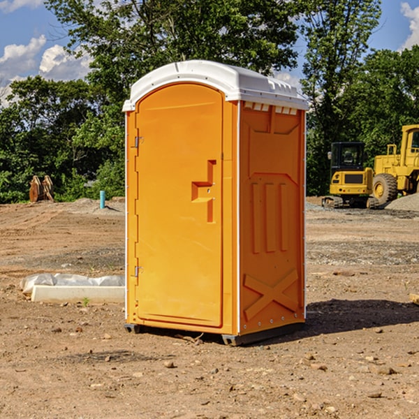 how often are the porta potties cleaned and serviced during a rental period in Woody